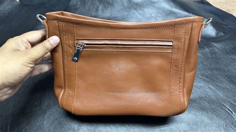 removing creases from purse bag